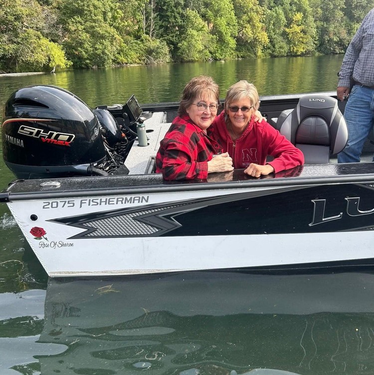 Sharon Vance is shown here (on right) with her sister Kate on her husband's boat, which he named "The Rose of Sharon."