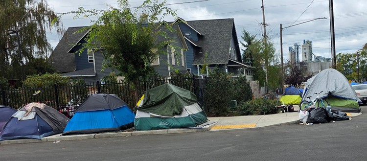 The city has shown it can ban camping and outside habitation near its homeless shelters but does not seem to care if camping happens in other neighborhoods. This photo was taken near downtown Vancouver on Sept. 22, 2026