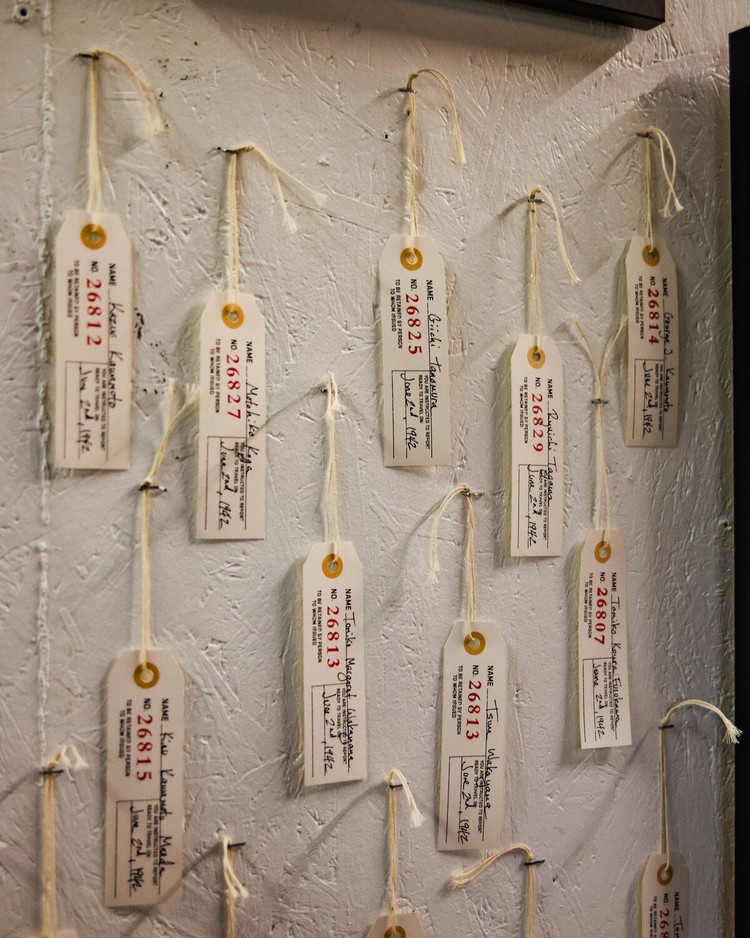 The Ridgefield Multicultural Initiative’s portion of “Meeting History: Exploring Ridgefield’s Told and Untold Stories” includes replica versions of identification tags Japanese Americans needed on themselves and luggage when forced to go to incarceration camps during World War II.