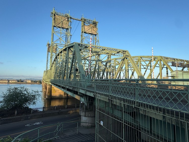 Transportation architect Kevin Peterson argues that achieving a 20% Columbia River transit mode share via LRT would require $25 to $45 billion or more over roughly five decades.