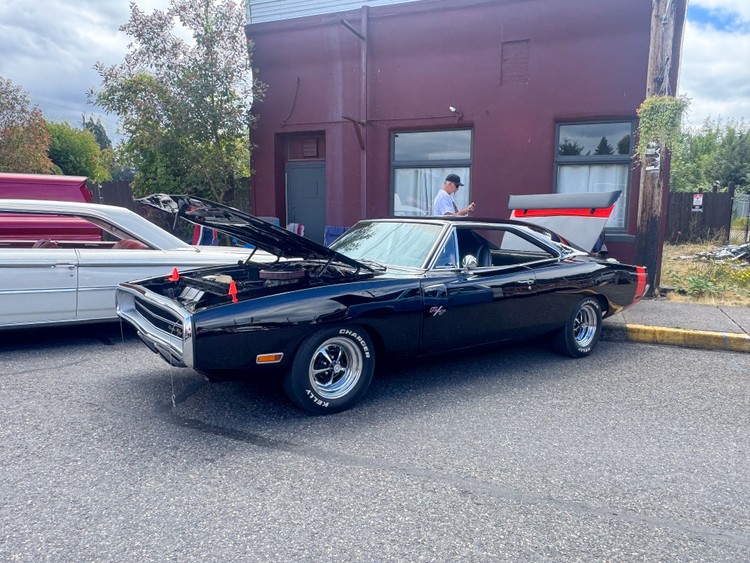 Impact Automotive's Yacolt car show raised more than $2,500 for veterans' equine therapy mental health program.