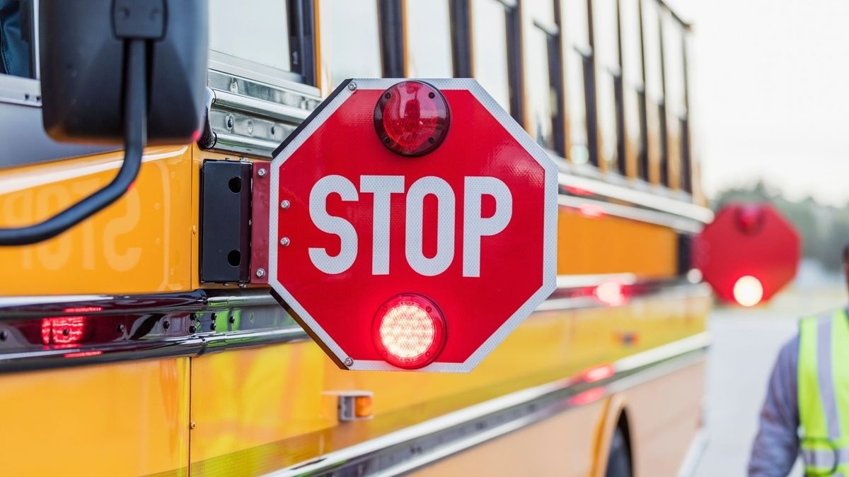 Opinion: A school bus, a four-way stop, and the meaning of ‘either’