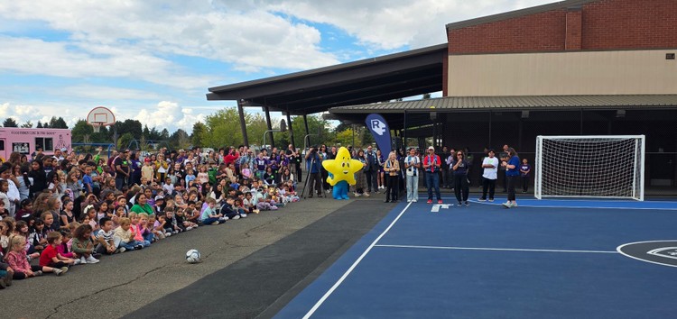 The Orchards Elementary School student body and other guests from throughout Evergreen Public Schools were invited to the opening ceremony of the mini-pitch last week.
