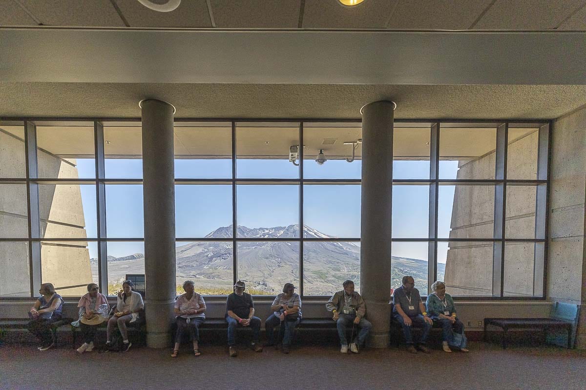Seen here is the view of Mt. St. Helens from inside the Johnston Ridge Observatory. The building is designed to blend into the landscape; even having rocks and plants on the roof. Photo by Mike Schultz