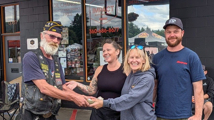 Pictured from left: American Legion Tum Tum Post 168 Commander Rick Halle, Tara Scott, Melissa McCoy-Yahn and Brad Yahn of Impact Automotive.