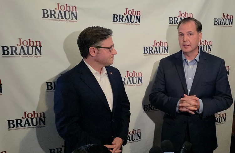 U.S. Speaker of the House Mike Johnson listens as John Braun answers a question on Thursday morning in Vancouver. Braun is running for Washington’s 3rd Congressional District. 