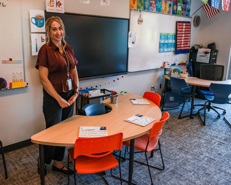 Tiffany Quast, Sunset Ridge Elementary intervention specialist, stands in her classroom at the new school campus in Ridgefield on Thursday, Oct. 15.