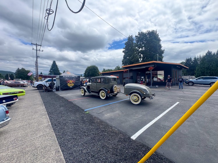 Impact Automotive's Yacolt car show raised more than $2,500 for veterans' equine therapy mental health program.